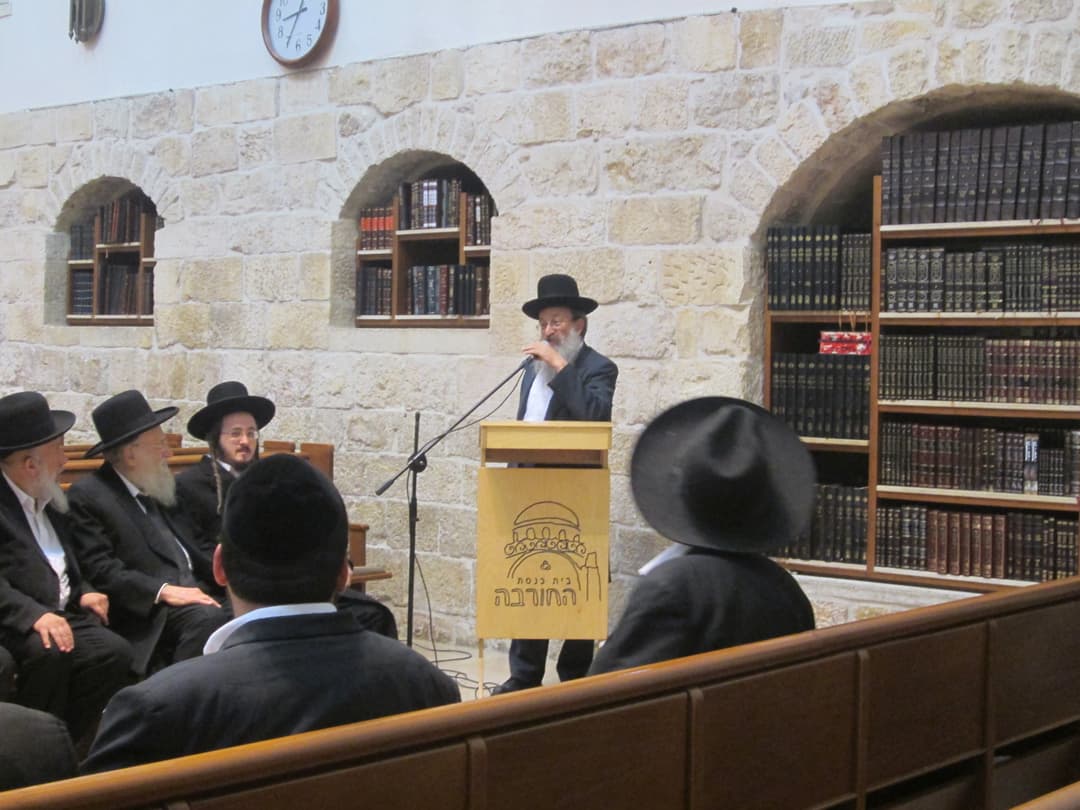 The synagogue's facade, made of finely hewn stone.