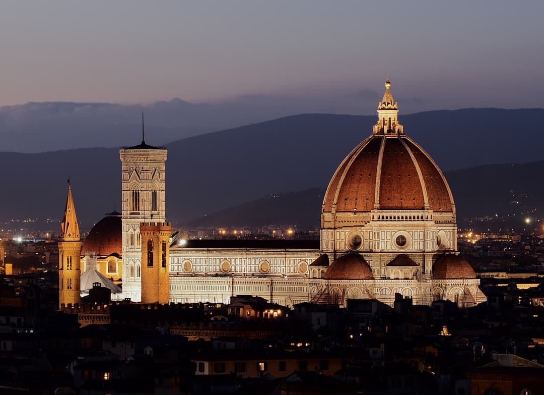 Florence Cathedral and Giotto's Campanile illuminated at dusk