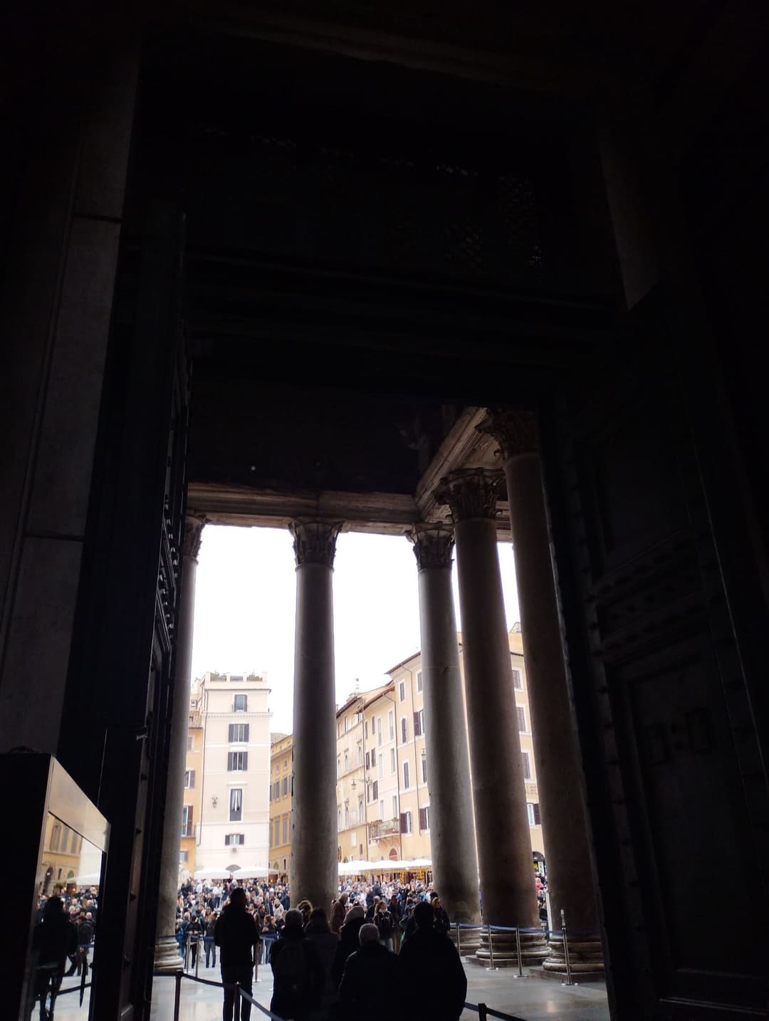 View looking out through the entrance doors toward Piazza della Rotonda.