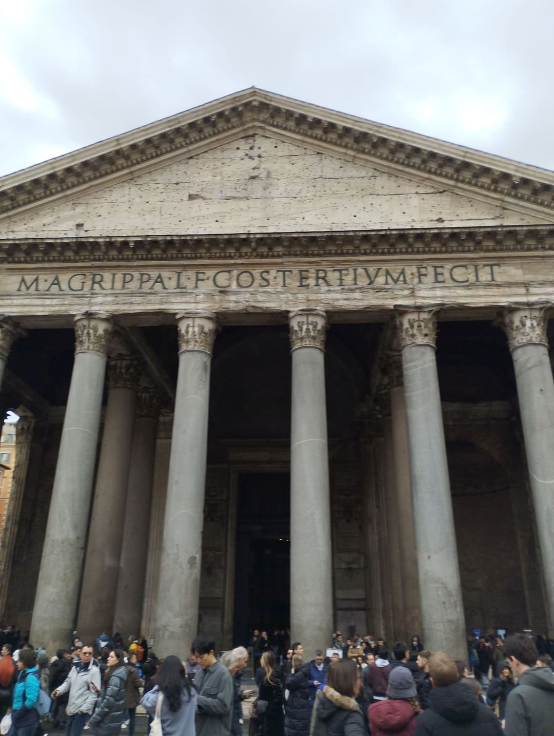 Front view of the Pantheon's portico facade and inscription in Rome.
