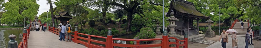 Panoramic view of vermilion bridges and Shinji Pond at Dazaifu Tenman-gū