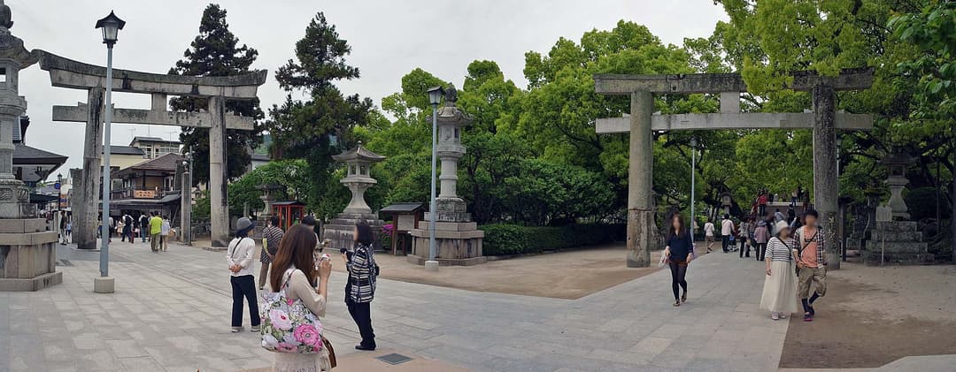Stone torii gates along the approach to Dazaifu Tenman-gū.
