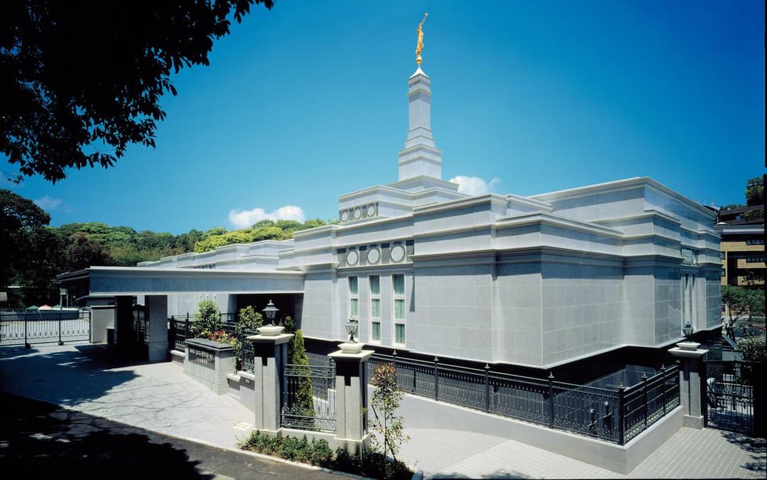 Fukuoka Japan Temple exterior, daytime, featuring spire and Angel Moroni.