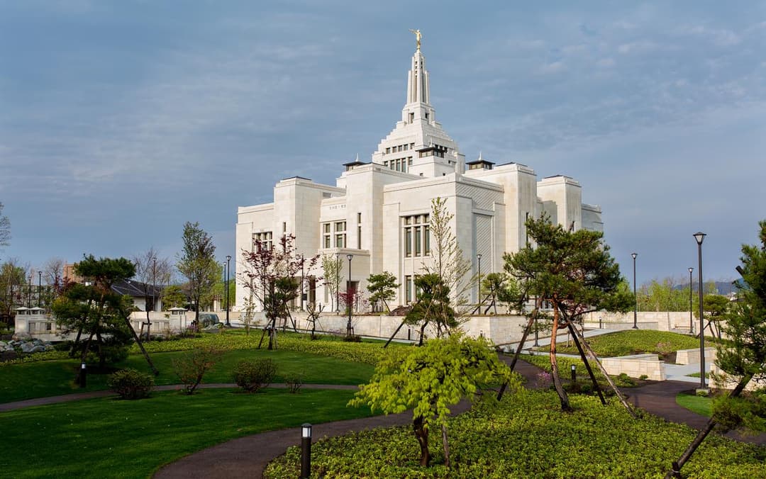 Exterior view of the Sapporo Japan Temple and its landscaped grounds.