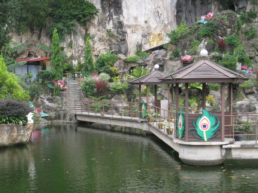 Footbridge and gazebos over the koi pond at Cave Villa, Batu Caves.