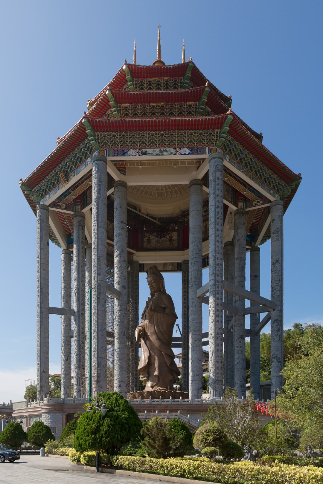 Bronze Guan Yin statue under the octagonal pavilion at Kek Lok Si Temple.