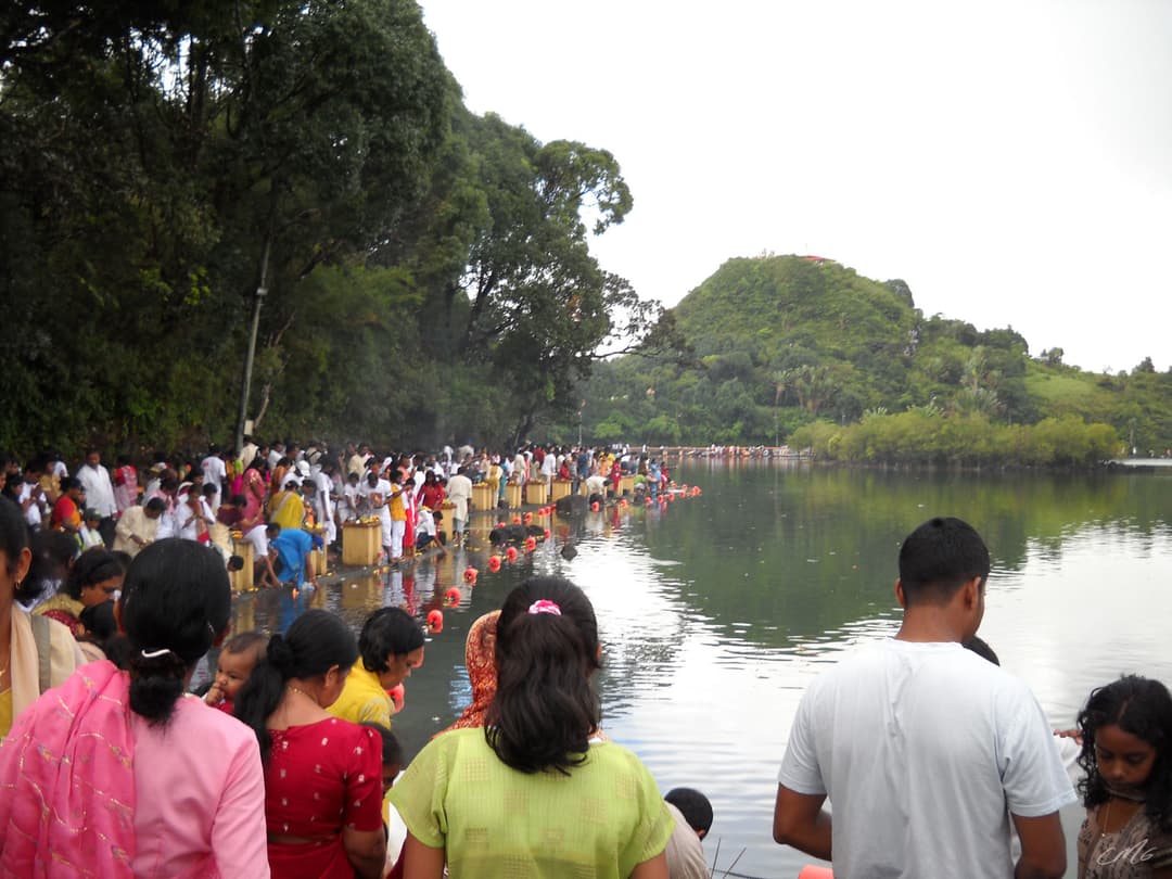 Pilgrims performing rituals along the shores of Ganga Talao.