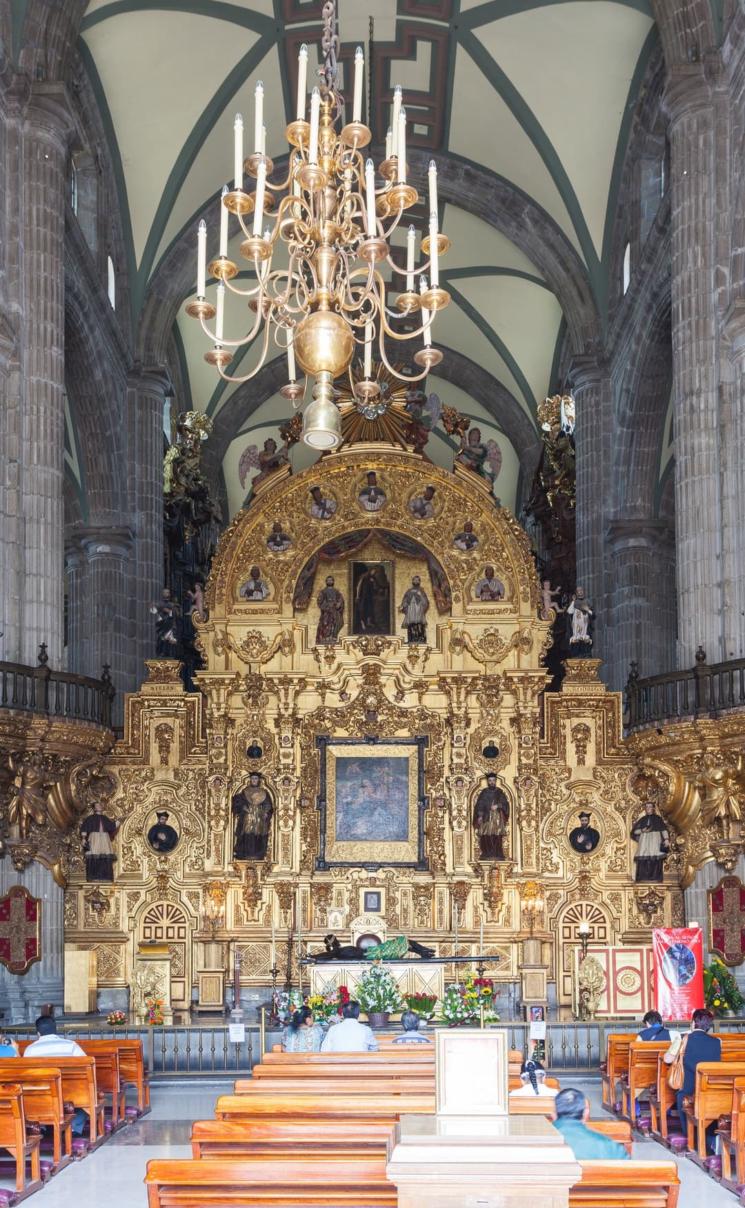 The golden Baroque Altar del Perdón inside Mexico City Metropolitan Cathedral.