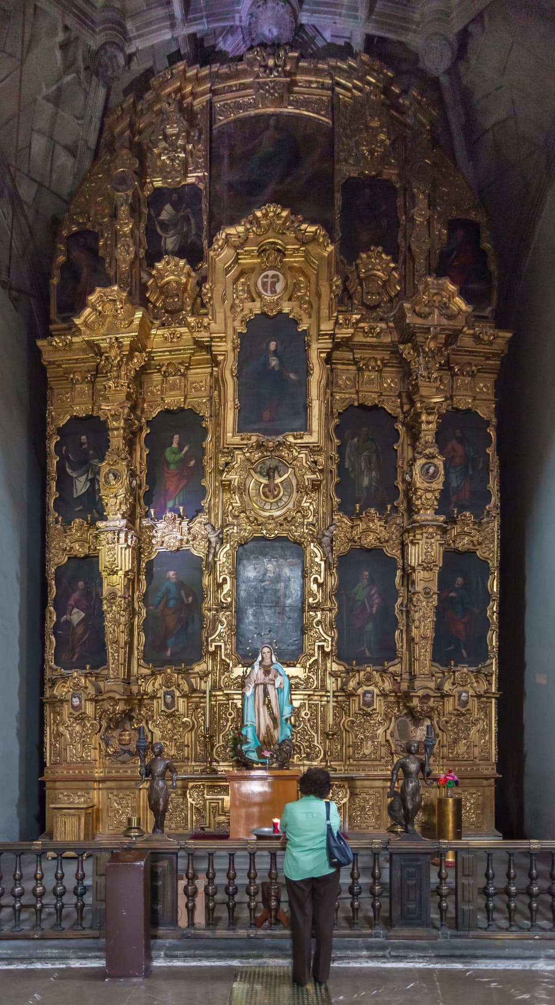 Ornate golden Baroque altarpiece inside the Mexico City Cathedral