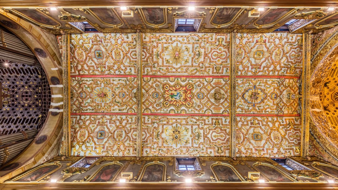 Ornate gilded Baroque ceiling inside the Church of San Francisco.