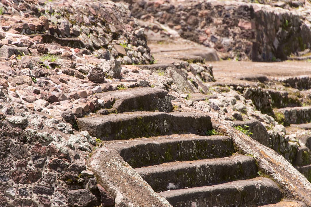 Detail of weathered stone steps on an ancient platform at Teotihuacan.