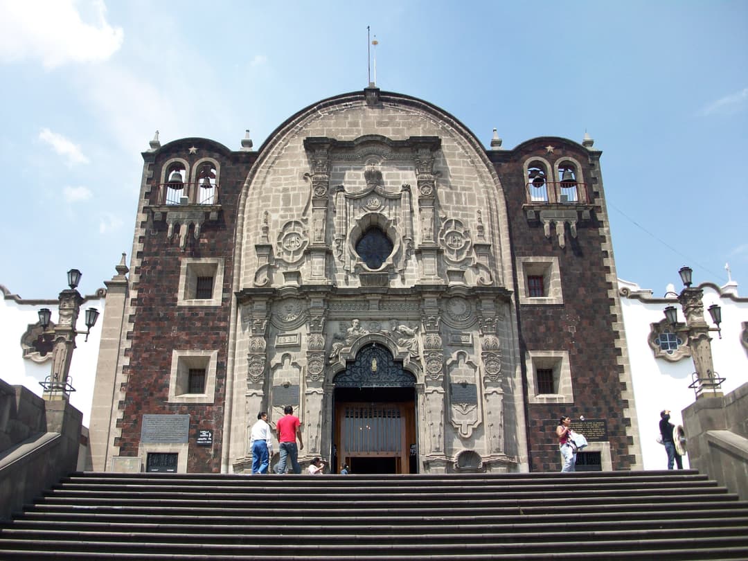 Front view of the Capilla del Cerrito facade from the main steps.