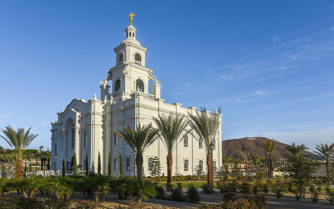Daytime exterior view of the Tijuana Mexico Temple and landscaped gardens.