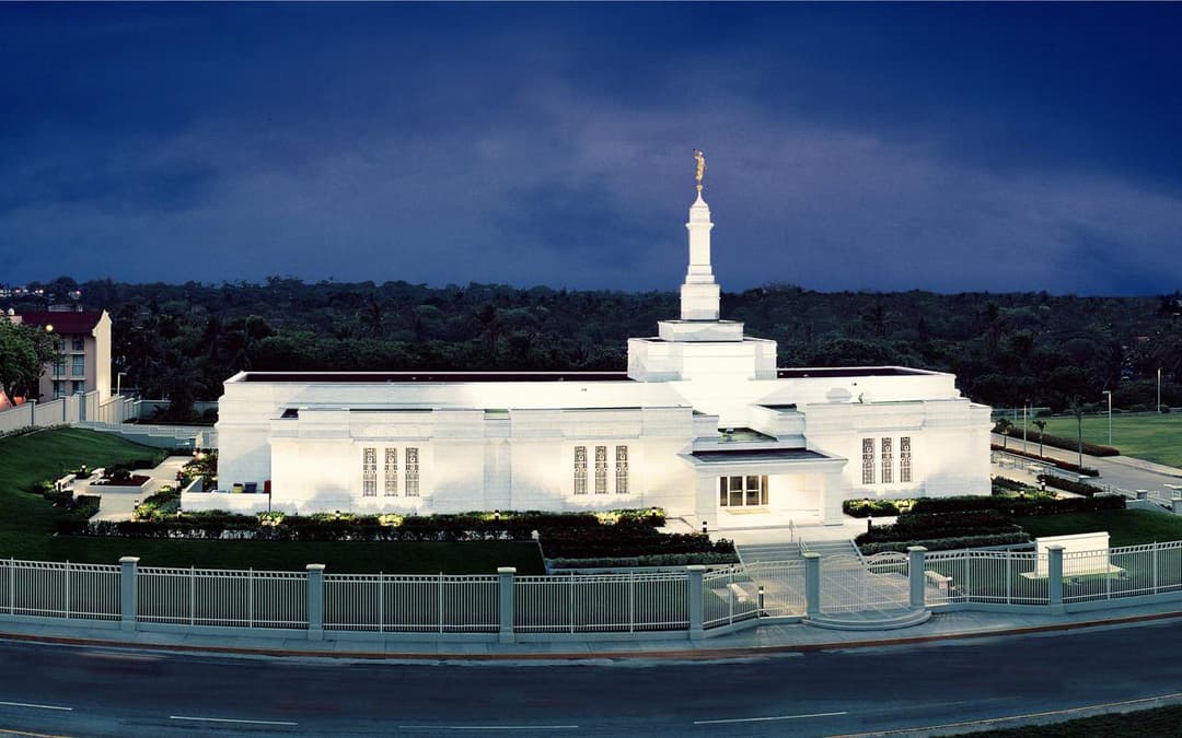 Exterior wide-angle view of the Veracruz Mexico Temple illuminated at twilight.