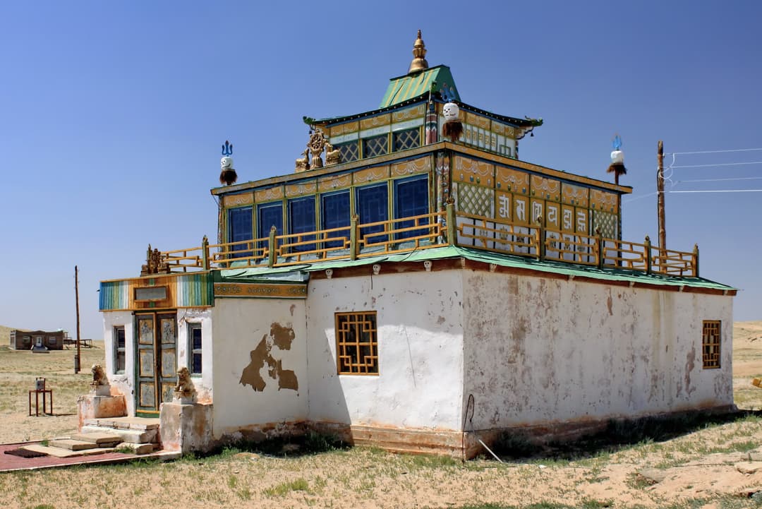 Exterior three-quarter view of a small Buddhist temple at Khamarin Hiid.