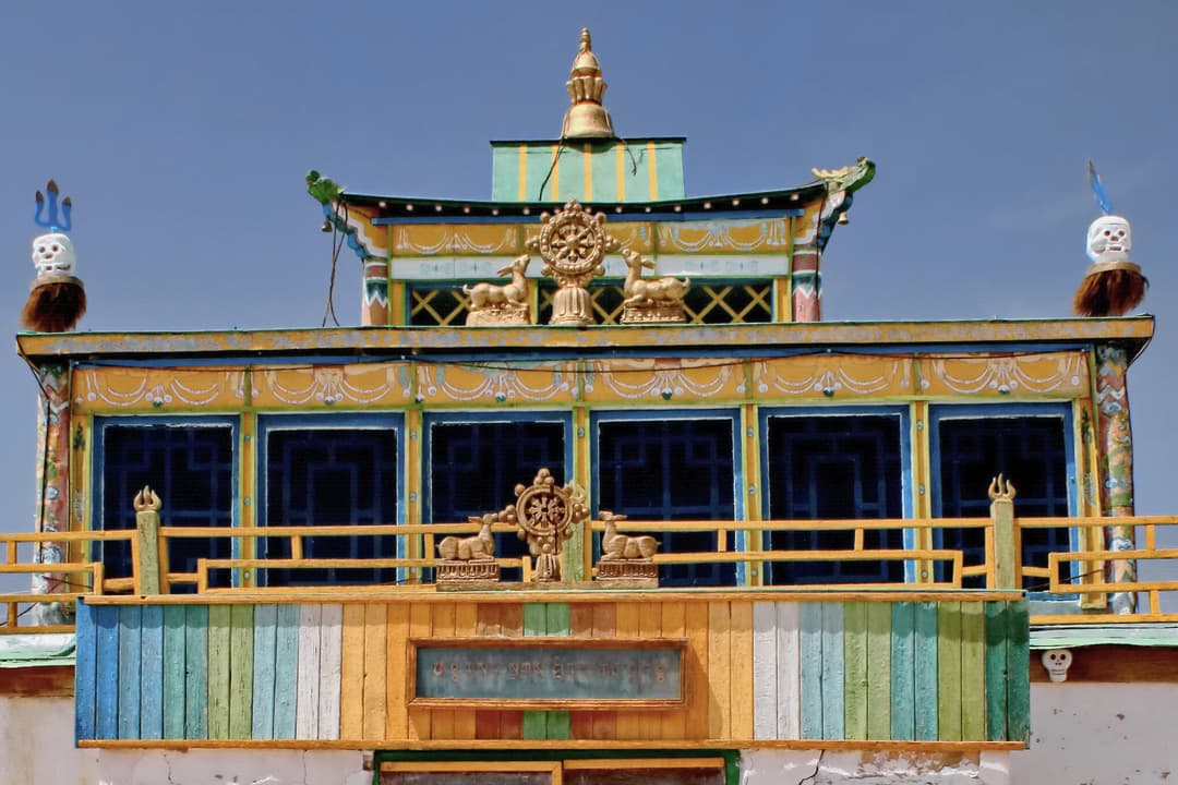 Front view of the ornate roof with golden Dharmachakra at Khamarin Hiid.