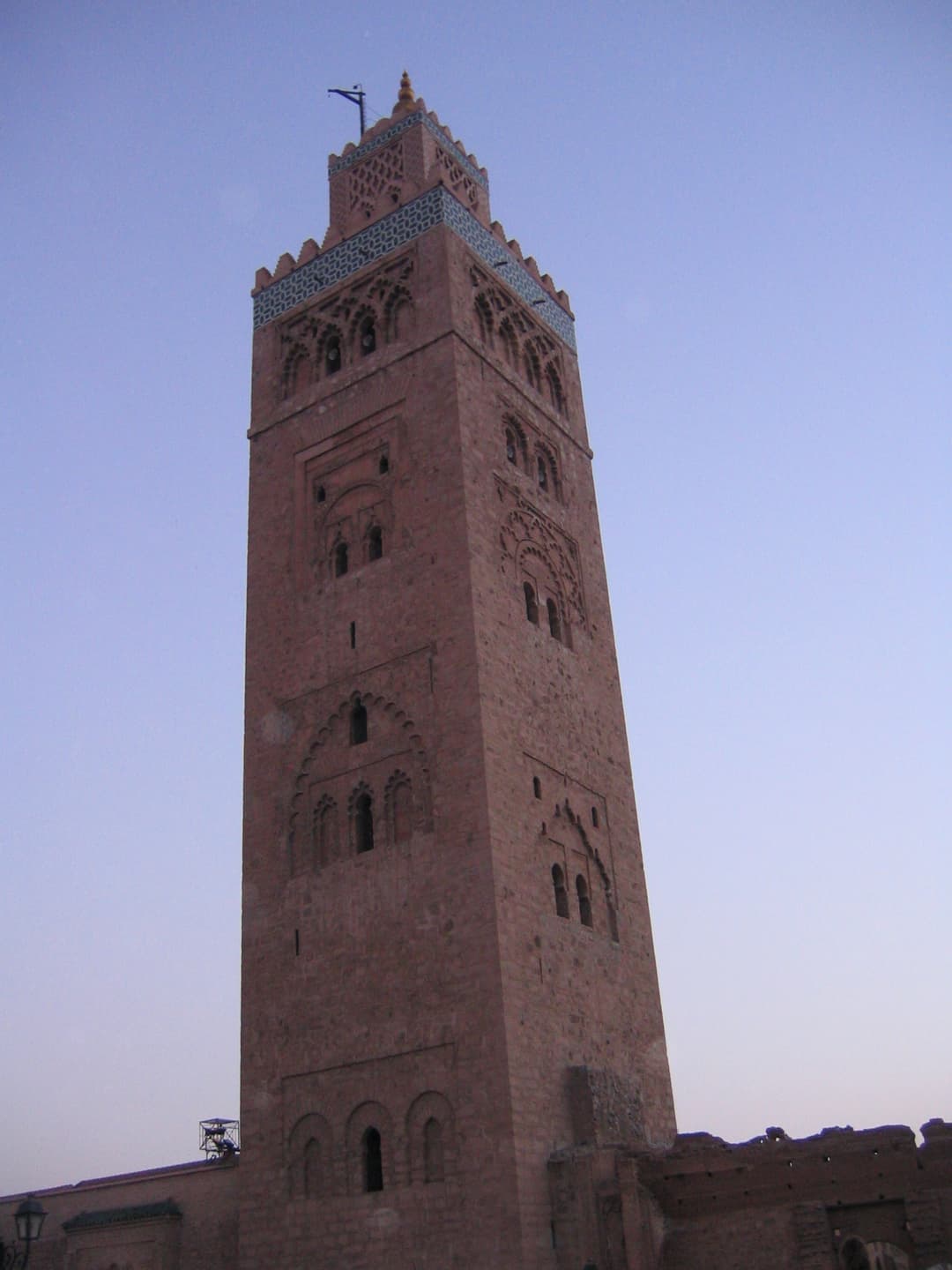 Low-angle view of the Koutoubia minaret at twilight