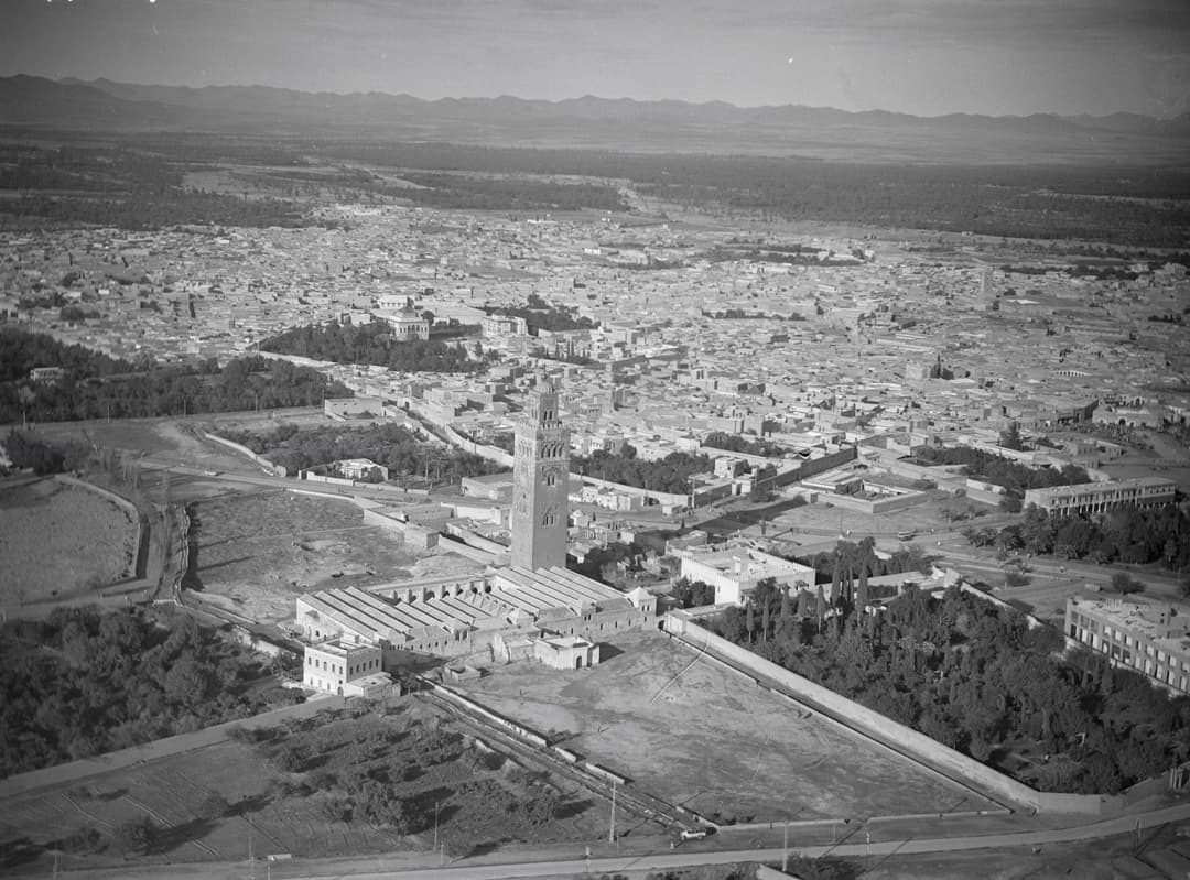 Vintage aerial view of the Koutoubia Mosque and the Marrakesh medina.