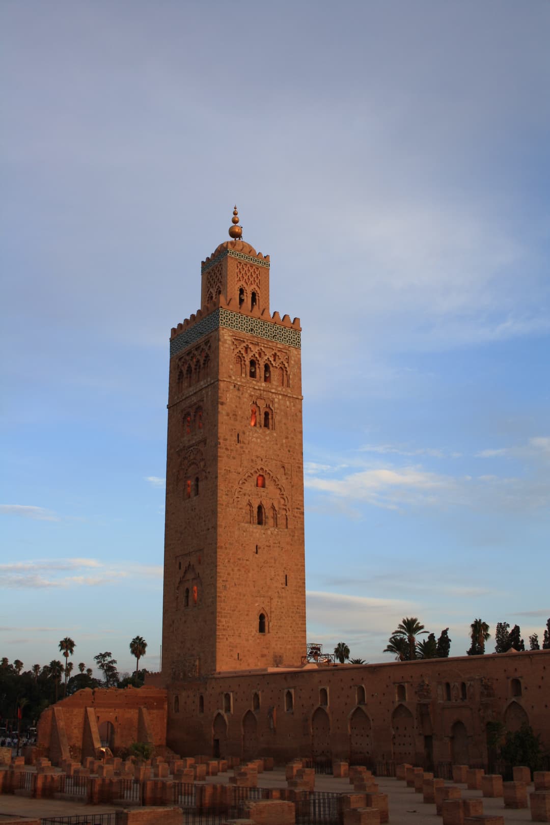 Koutoubia Mosque minaret and archaeological ruins in late afternoon light
