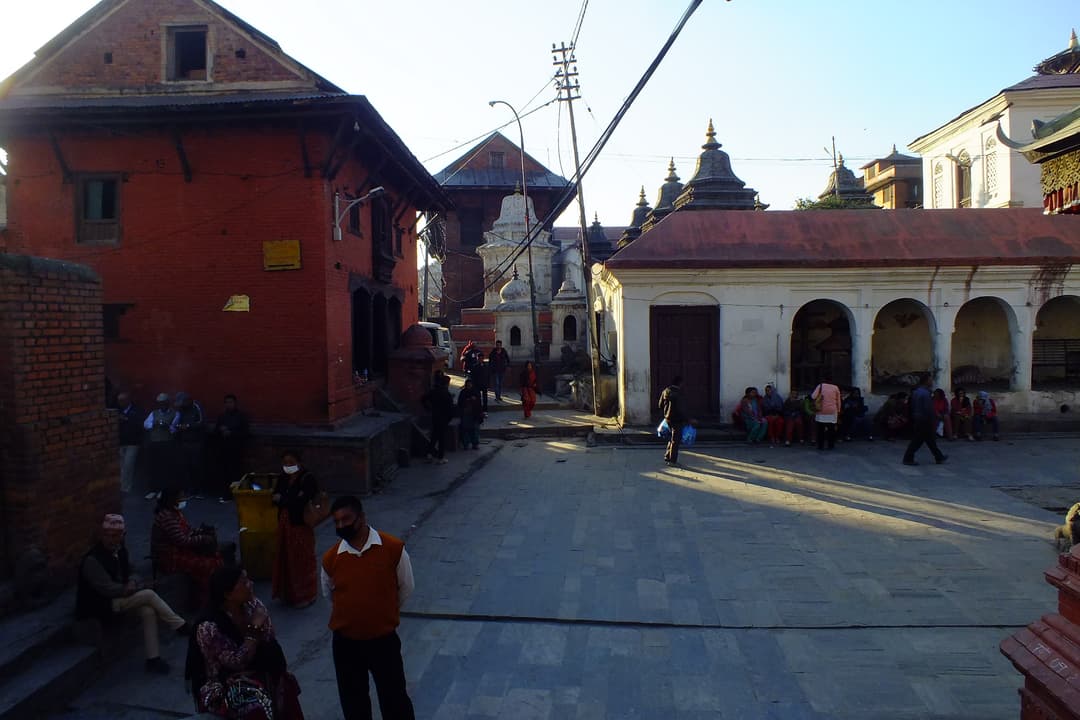 Sunlit courtyard and shrines at the Pashupatinath Temple complex