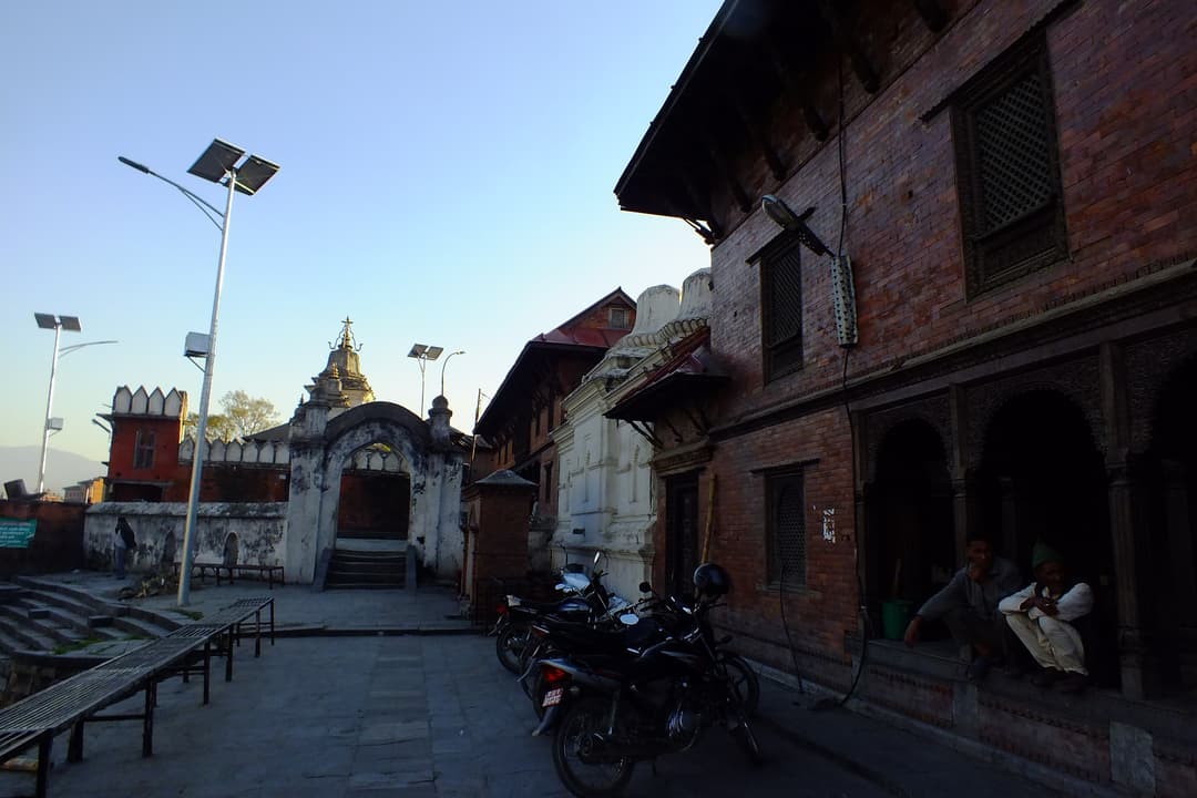 Courtyard with brick architecture and gateway in Pashupatinath complex