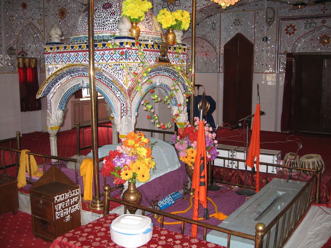 Interior of Gurdwara Panja Sahib showing the ornate Palki Sahib