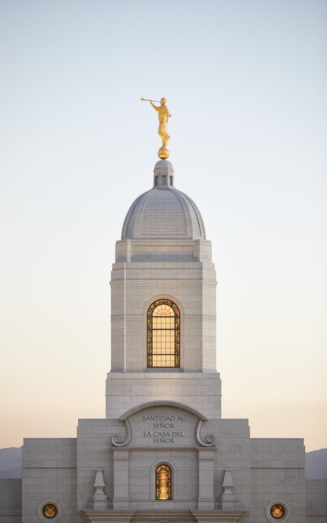 The temple illuminated at night, creating a peaceful and reverent atmosphere.
