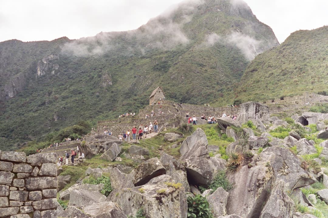 View looking up past granite quarry to the Guardhouse and misty slopes