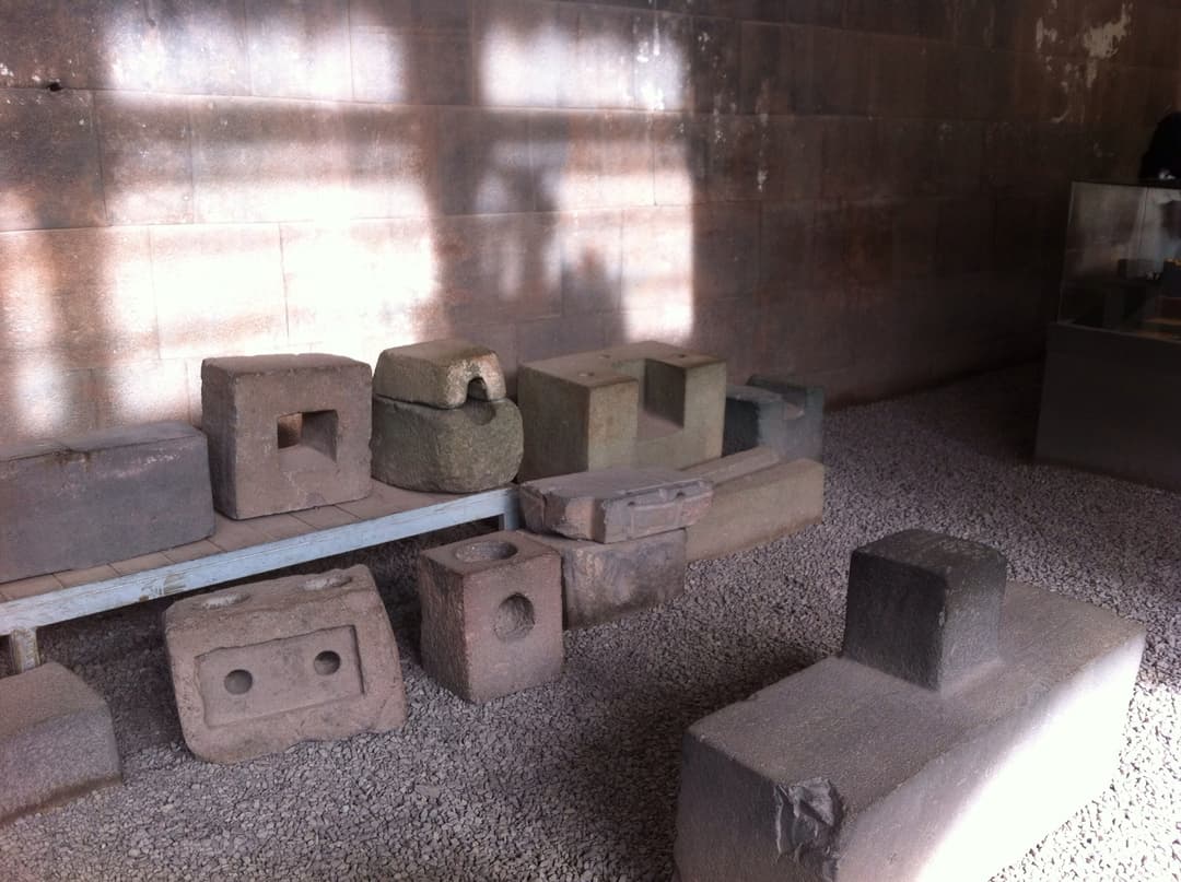 Carved Inca masonry blocks with interlocking sockets inside Qorikancha.