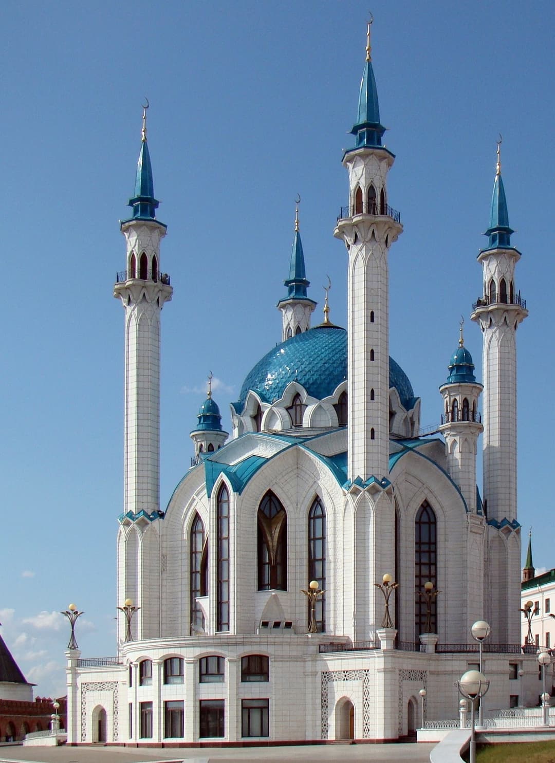 The blue dome and minarets of the Kul Sharif Mosque under a clear sky