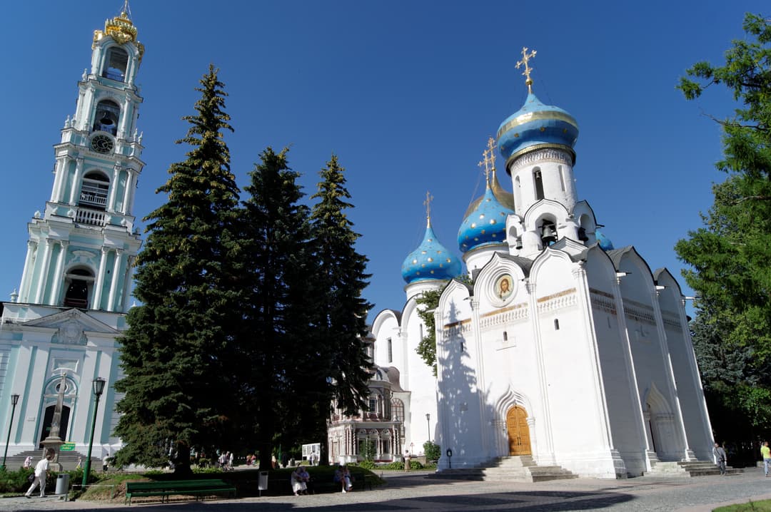 Baroque bell tower and Church of the Holy Spirit with star-spangled blue domes