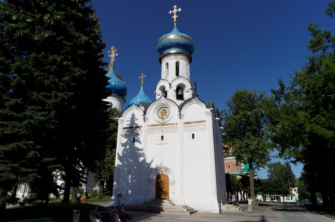 Exterior view of the Church of the Holy Spirit under clear blue skies