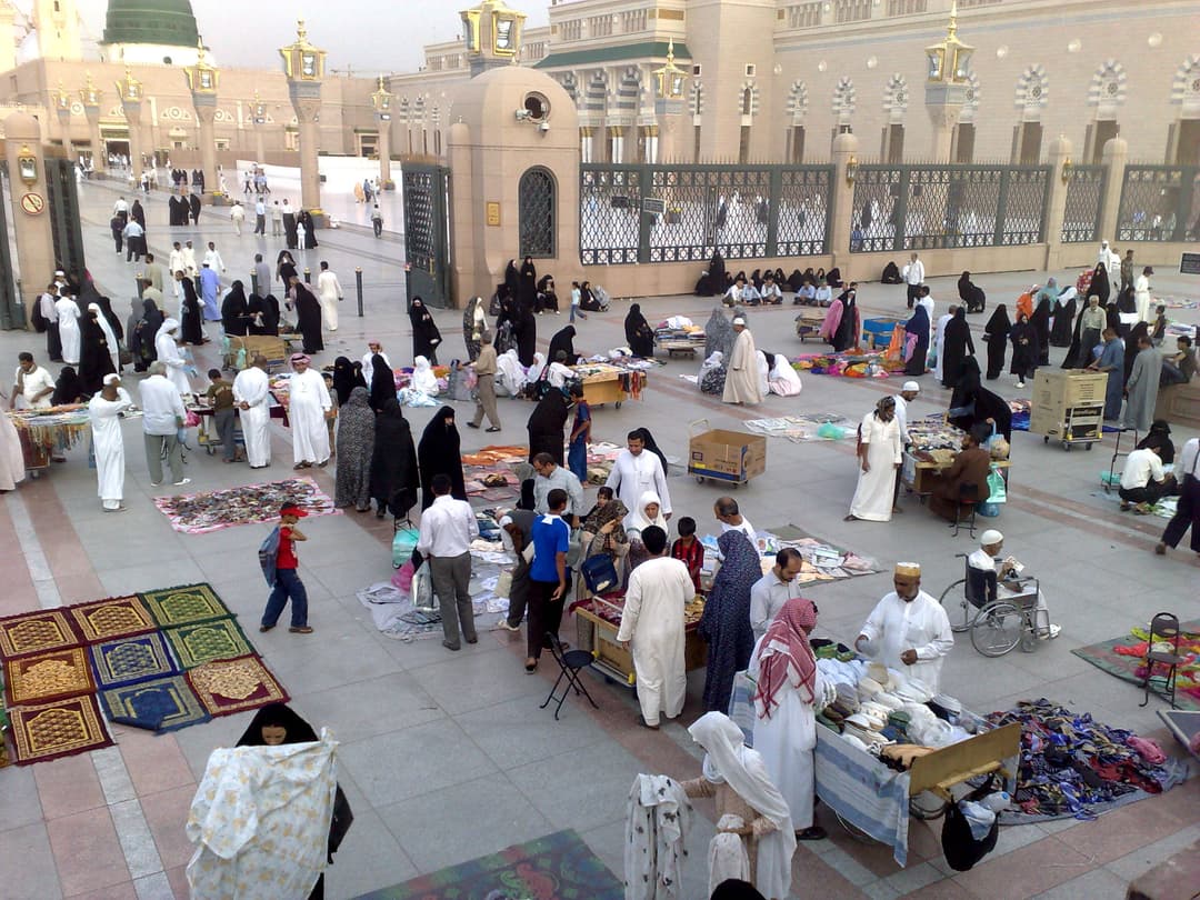 The interior of the mosque, adorned with ornate decorations and calligraphy.
