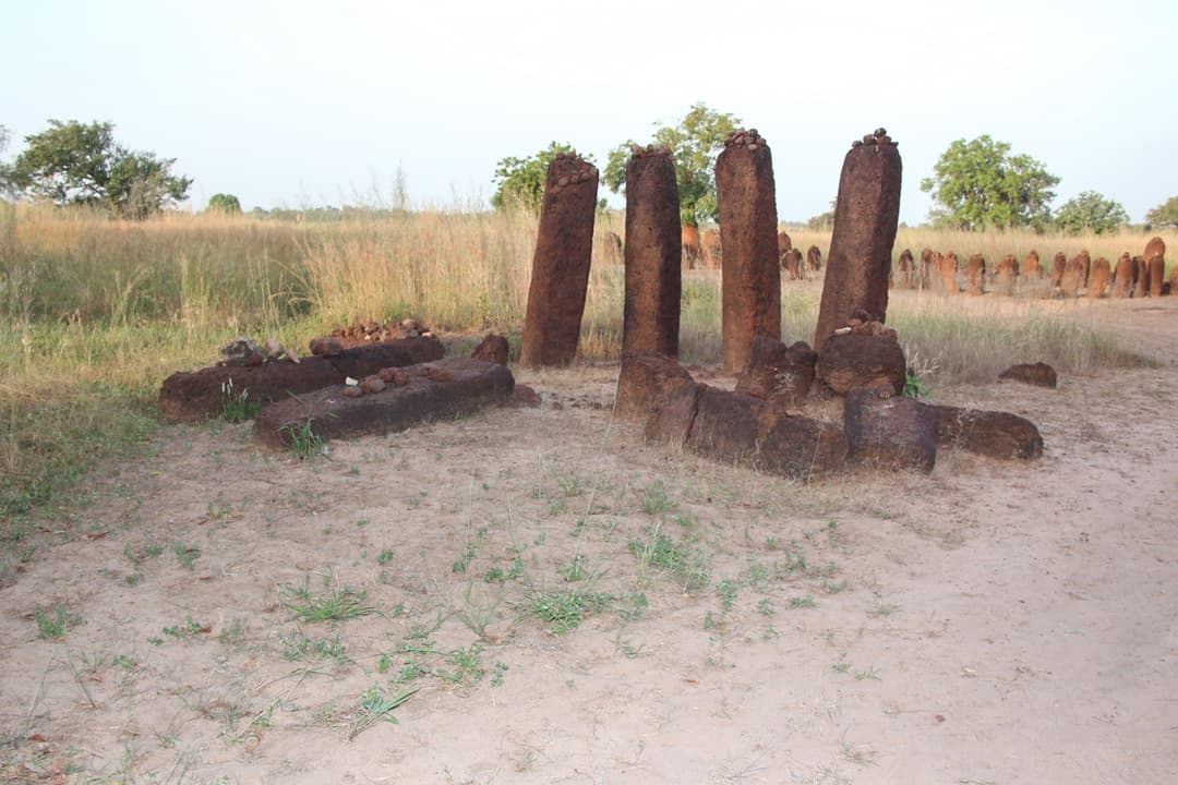 Standing laterite monoliths and fallen stones at Sine Ngayène.