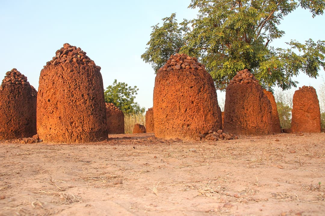 Laterite megaliths at Sine Ngayène in warm afternoon light.