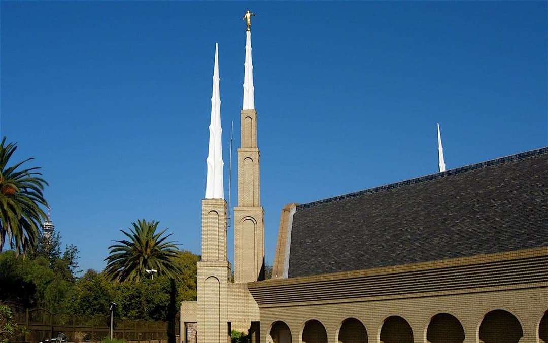 The Johannesburg South Africa Temple surrounded by lush greenery.