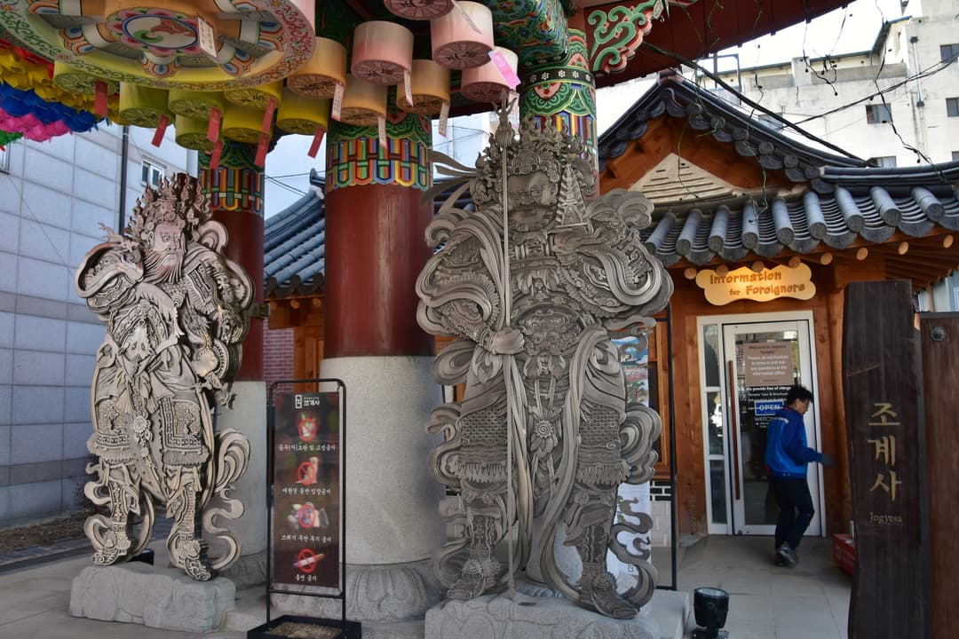 Guardian statues at the entrance of Jogyesa Temple, Seoul.