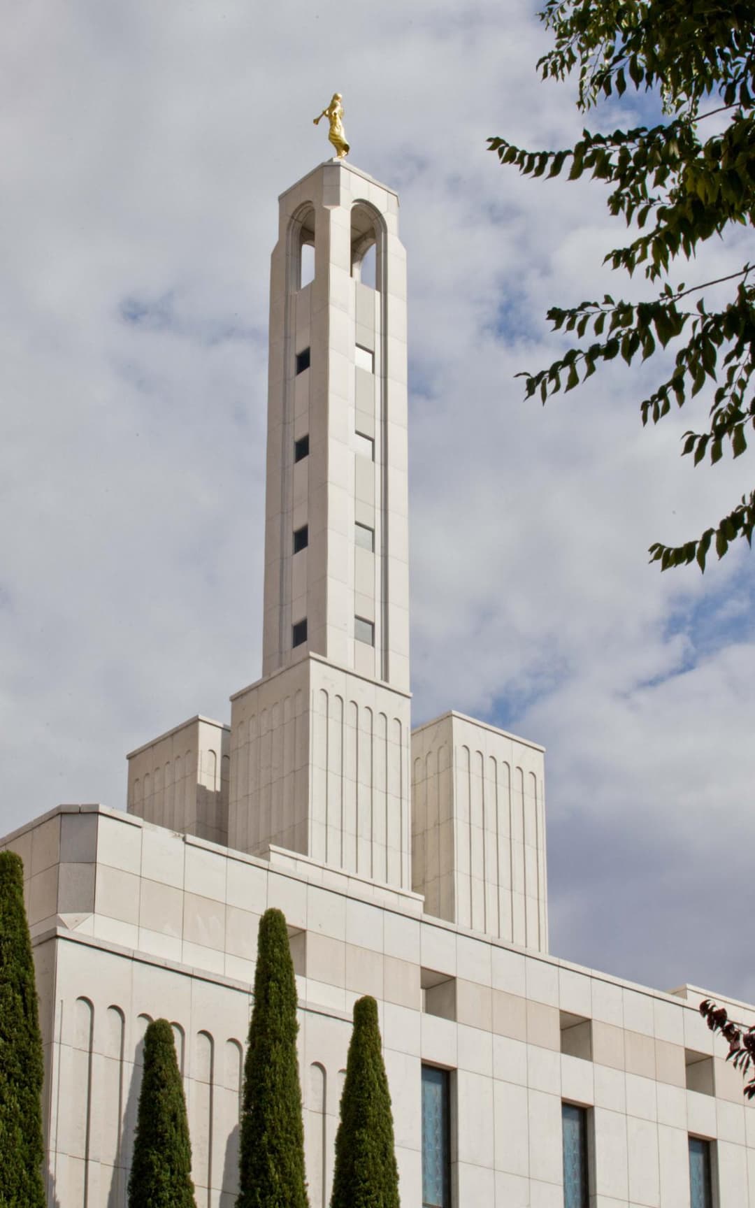 The temple's architecture features a modern-classical design.