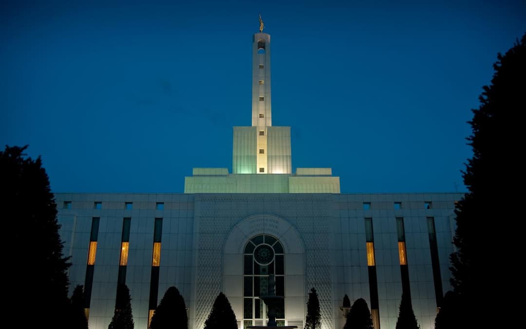 A close-up view of the temple's spire and angel Moroni statue.