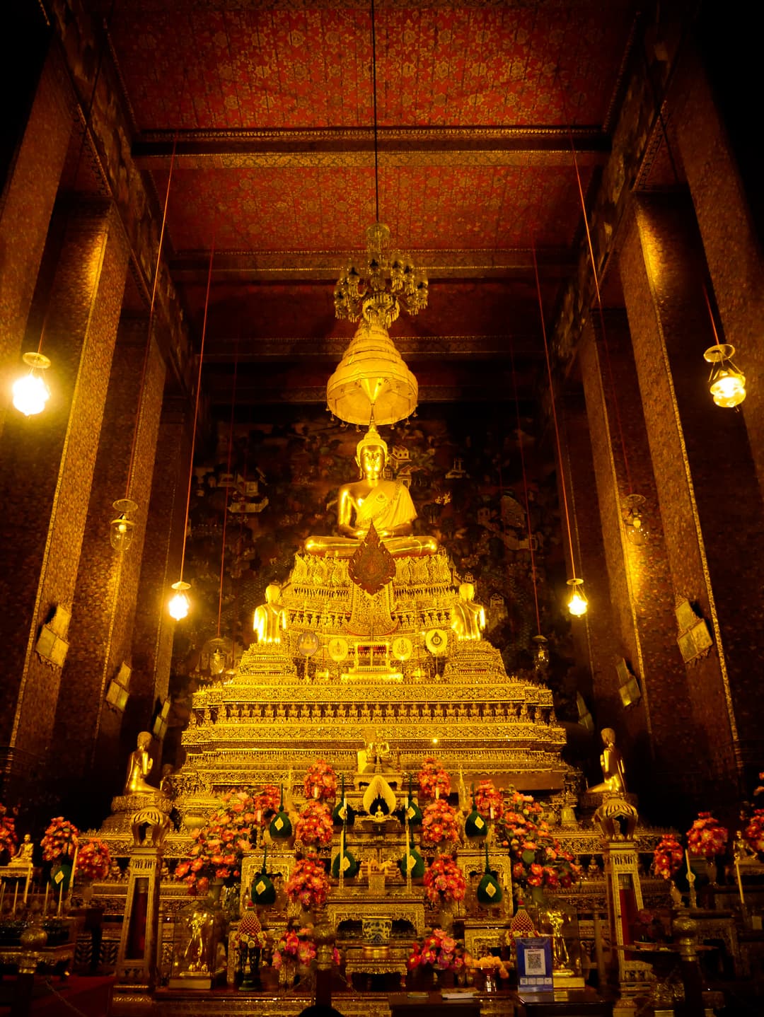 Principal golden Buddha statue inside the ordination hall of Wat Pho.