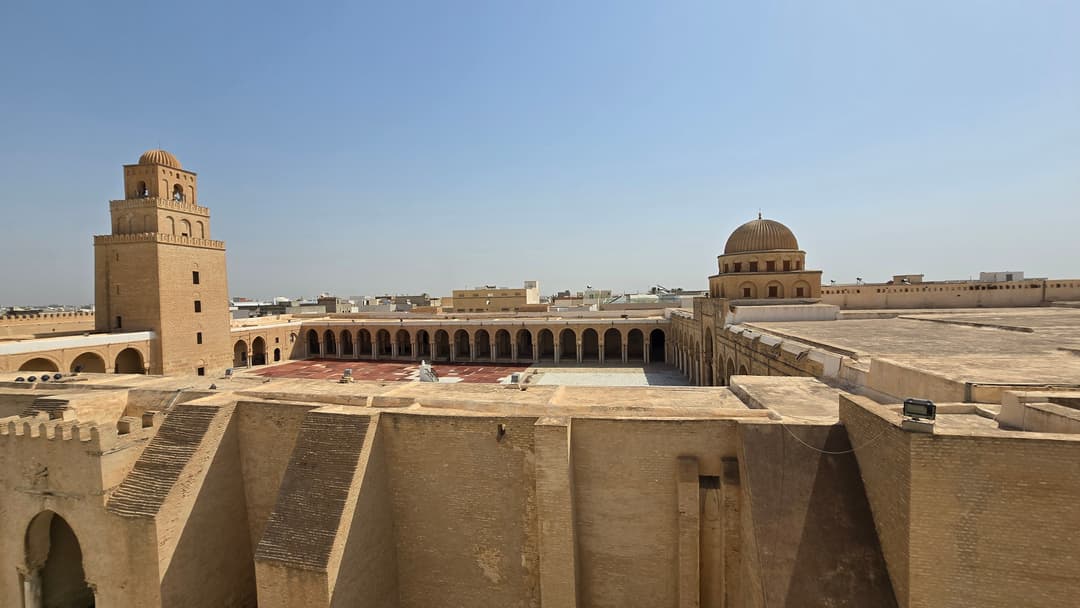 Elevated view of the courtyard, minaret, and ribbed dome