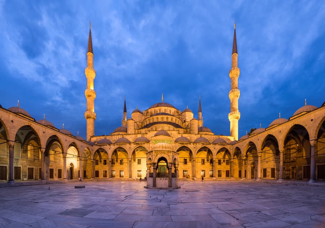 Courtyard and ablution fountain of Sultan Ahmed Mosque at twilight