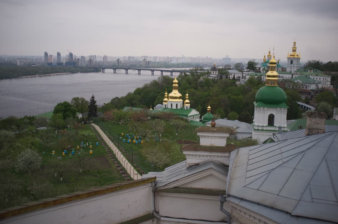 Elevated view over Lower Lavra domes and apiary toward the Dnieper River