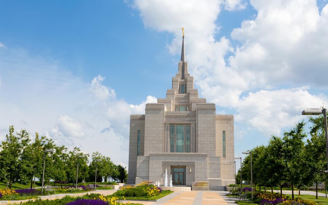 Exterior front view of the Kyiv Ukraine Temple and gardens in daylight.