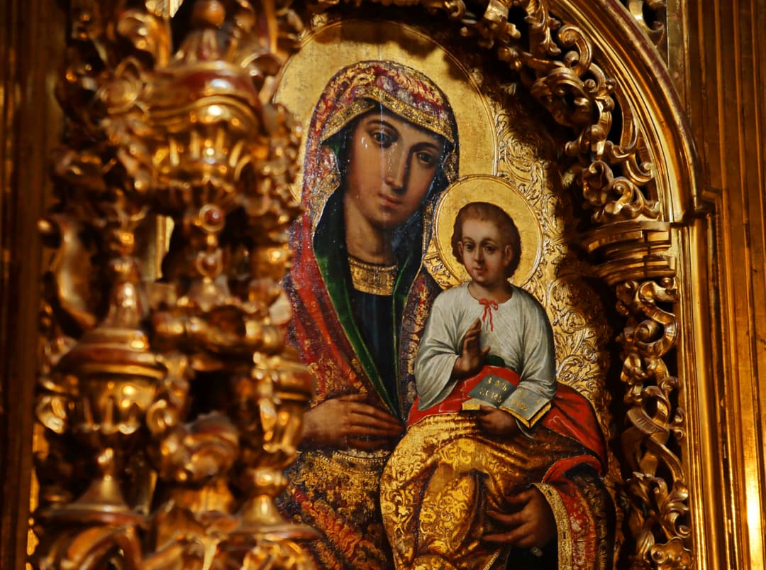 Icon of the Virgin and Child in an ornate gilded Baroque frame