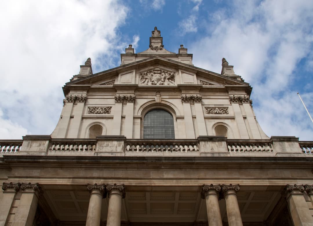 Low-angle view of the Neo-Baroque front facade of the Brompton Oratory.
