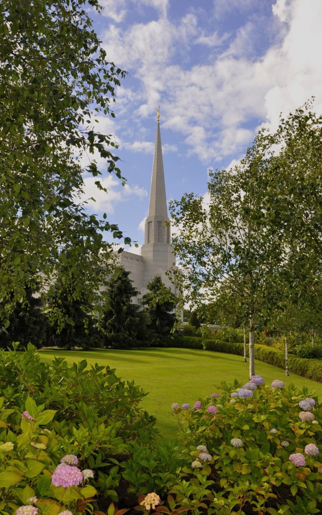 The temple's elegant facade under a cloudy sky.