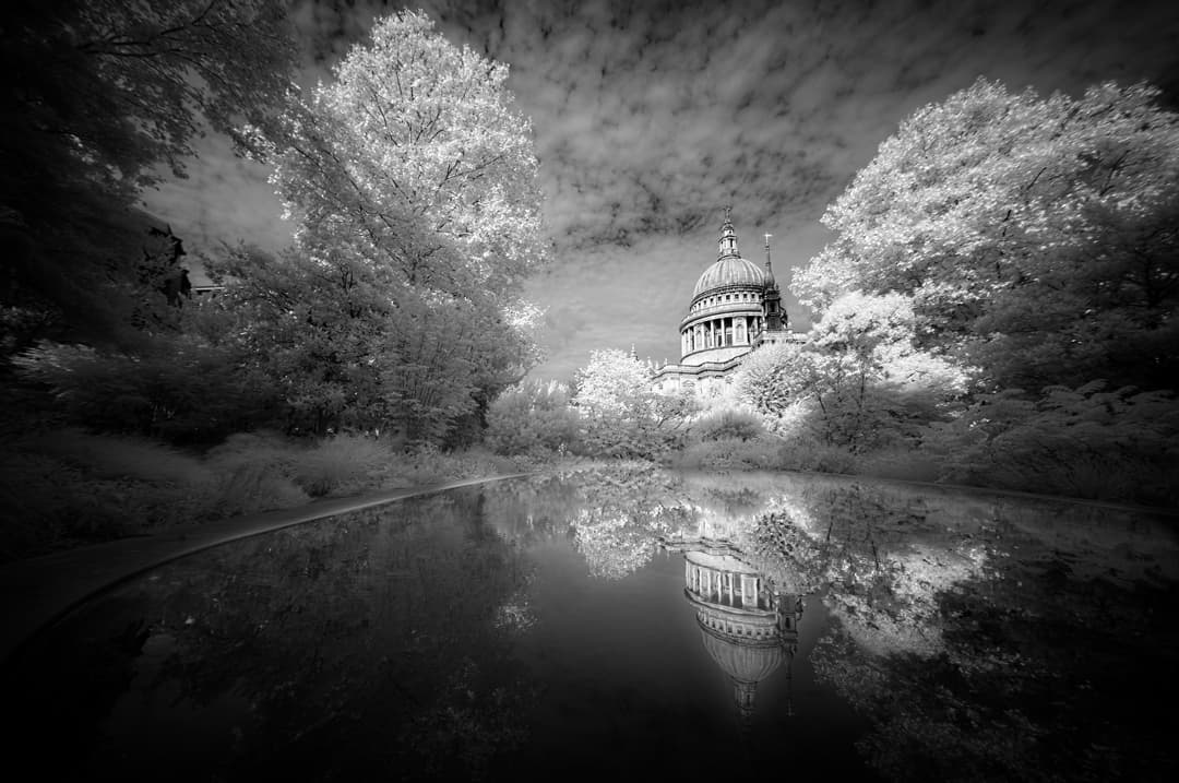Infrared wide-angle view of St. Paul's Cathedral dome and reflecting pool.