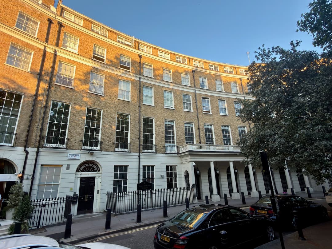 Wide-angle exterior view of the Georgian crescent facade at golden hour.