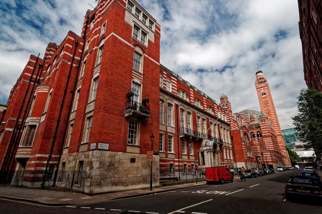 Wide-angle view along Ambrosden Avenue toward Westminster Cathedral campanile.